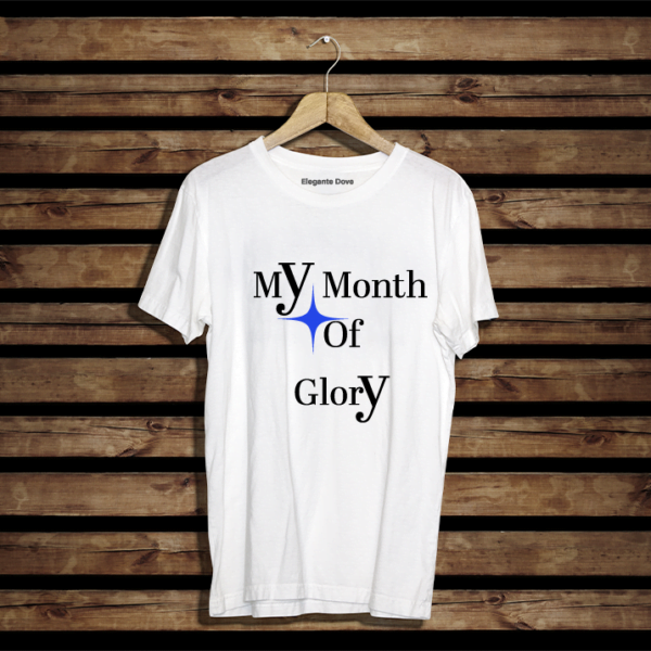 Heavy Cotton T-shirt. Regular fit. Featuring a Star and Text "My month of Glory". T-shirt colour white. Star Colour Blue. Text colour. Black