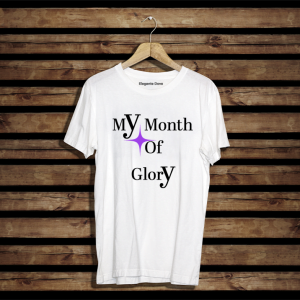 Heavy Cotton T-shirt. Regular fit. Featuring a Star and Text "My month of Glory". T-shirt colour white. Star Colour purple. Text colour. Black